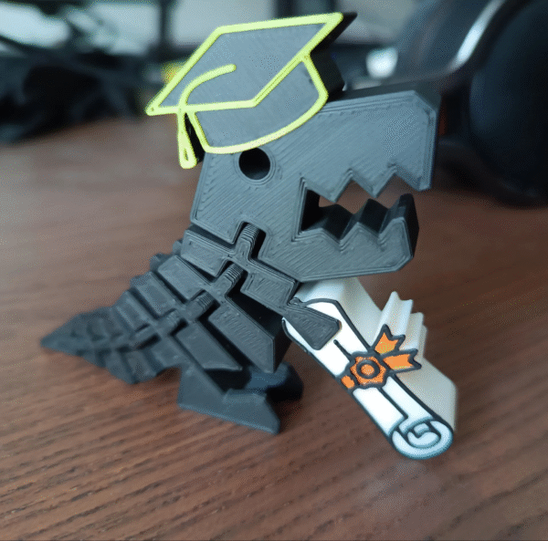 T-Rex flexible 3D con birrete de graduación y diploma en mano