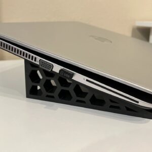 Soporte portátil impreso en 3D con diseño hexagonal negro