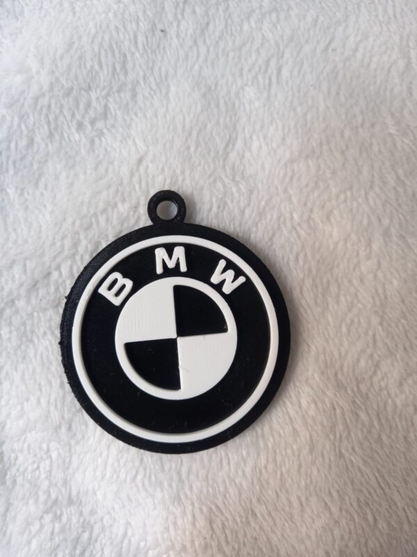 llavero logo bmw blanco y negro biodegradable